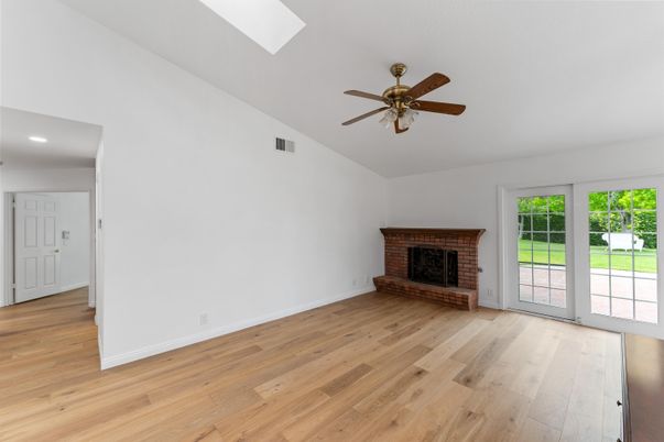 Empty room, Fireplace, Interior, Recessed Lighting, Wood Texture Flooring