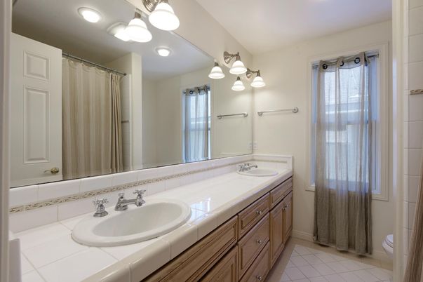 Bathroom, Dual Sink Vanities, Interior, Recessed Lighting, Tile Countertops