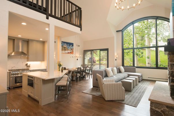 Chandelier, Dining room, Interior, Kitchen, Living room, Recessed Lighting, Stainless Steel Appliances, Wood Texture Flooring