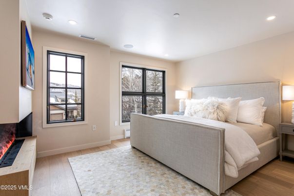 Bedroom, Fireplace, Interior, Recessed Lighting, Wood Texture Flooring
