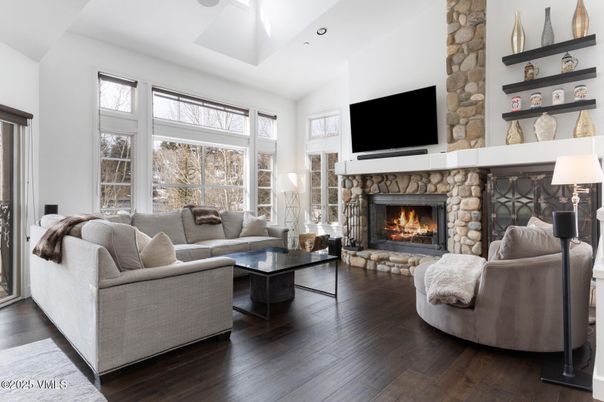 Fireplace, Interior, Living room, Recessed Lighting, Stone Walls, Wood Texture Flooring