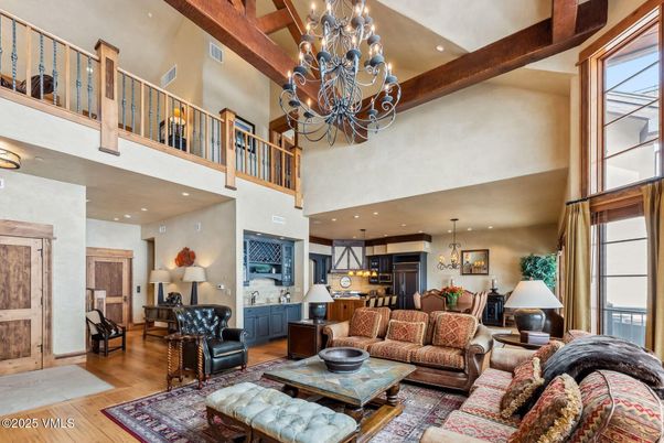 Chandelier, Dining room, Interior, Living room, Pendant Lights, Recessed Lighting, Wooden Beams, Wood Texture Flooring
