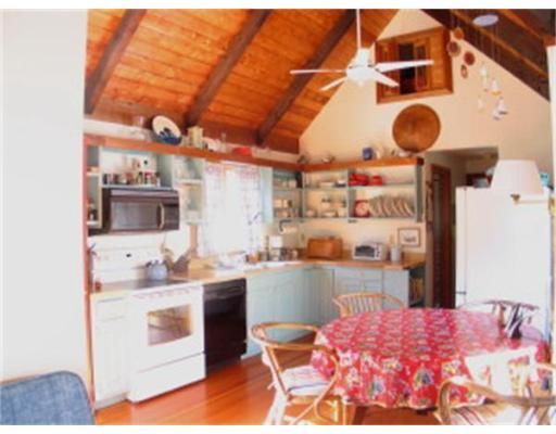 Interior, Kitchen, Wood Texture Flooring, Dining room, Wooden Beams, Wooden Ceilings, Stainless Steel Appliances, Pendant Lights