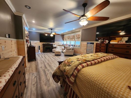 Bedroom, Fireplace, Interior, Recessed Lighting, Wood Texture Flooring