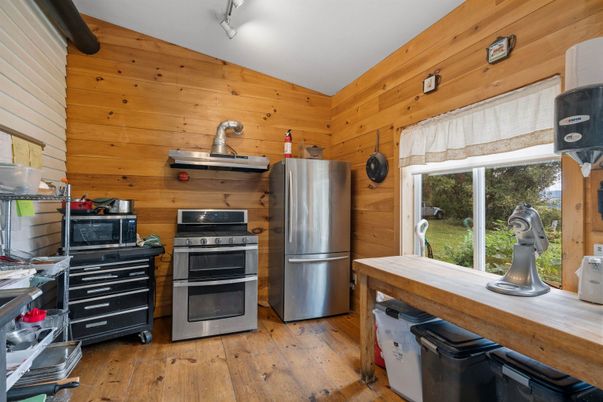Interior, Kitchen, Stainless Steel Appliances, Wood Texture Flooring, Wooden Walls