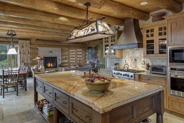 Dining room, Fireplace, Interior, Kitchen, Living room, Pendant Lights, Recessed Lighting, Stainless Steel Appliances, Stone Walls, Wooden Beams, Wooden Ceilings