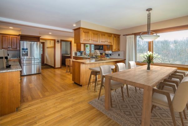 Dining room, Interior, Kitchen, Pendant Lights, Recessed Lighting, Stainless Steel Appliances, Wood Texture Flooring
