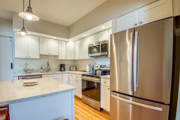 Interior, Kitchen, Pendant Lights, Recessed Lighting, Stainless Steel Appliances, Wood Texture Flooring