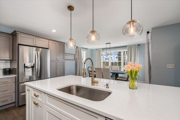 Dining room, Interior, Kitchen, Pendant Lights, Recessed Lighting, Stainless Steel Appliances, Wood Texture Flooring