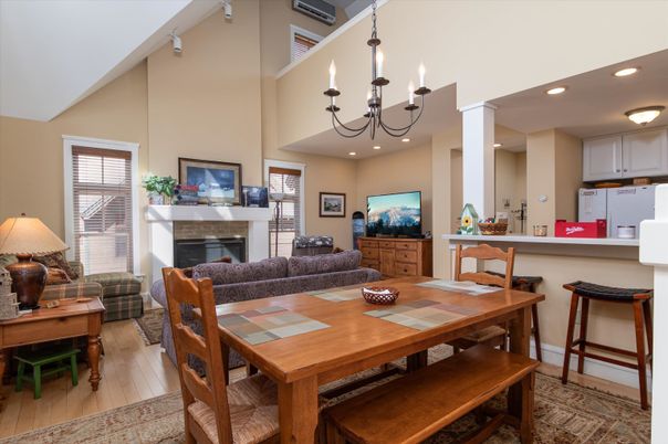 Chandelier, Dining room, Fireplace, Interior, Kitchen, Living room, Recessed Lighting, Wood Texture Flooring