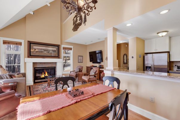 Dining room, Fireplace, Interior, Kitchen, Living room, Recessed Lighting, Stainless Steel Appliances, Wood Texture Flooring