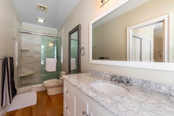 Bathroom, Glass Shower, Interior, Marble Walls, Wood Texture Flooring