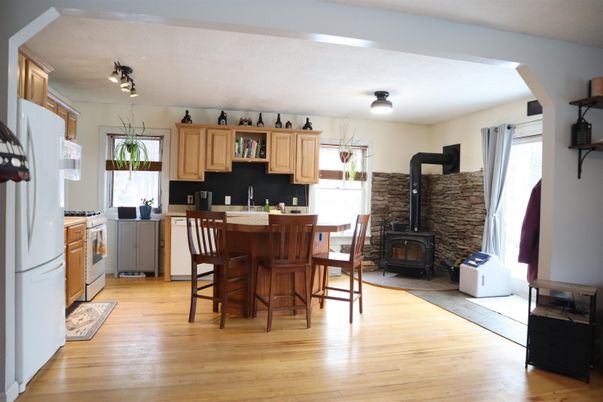 Dining room, Fireplace, Interior, Kitchen, Stone Walls, Wood Texture Flooring