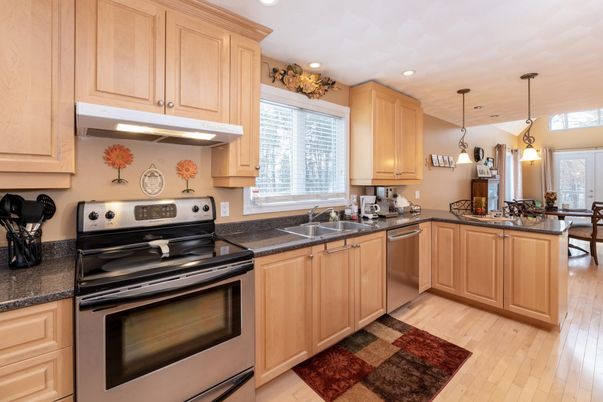 Dining room, Interior, Kitchen, Pendant Lights, Recessed Lighting, Stainless Steel Appliances, Wood Texture Flooring
