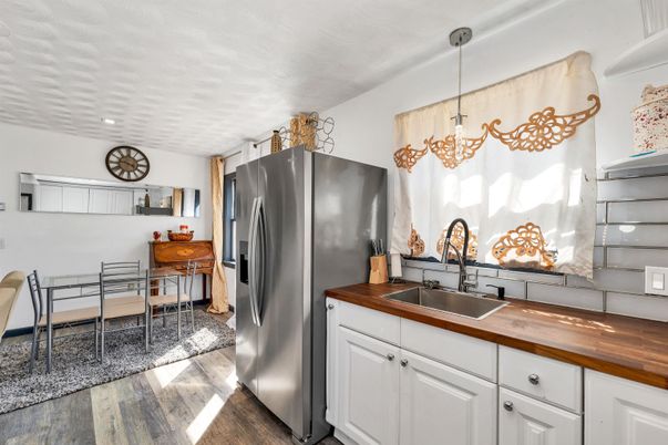 Dining room, Interior, Kitchen, Pendant Lights, Stainless Steel Appliances, Wood Texture Flooring
