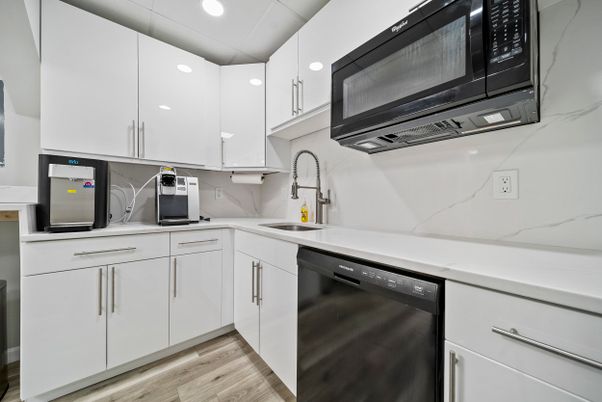 Interior, Kitchen, Marble Walls, Recessed Lighting, Stainless Steel Appliances, Wood Texture Flooring
