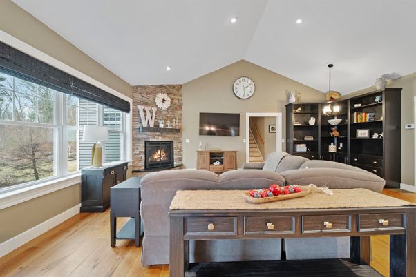 Fireplace, Interior, Living room, Pendant Lights, Recessed Lighting, Stone Walls, Wood Texture Flooring