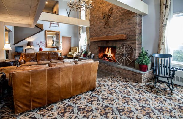 Chandelier, Fireplace, Interior, Living room, Stone Walls