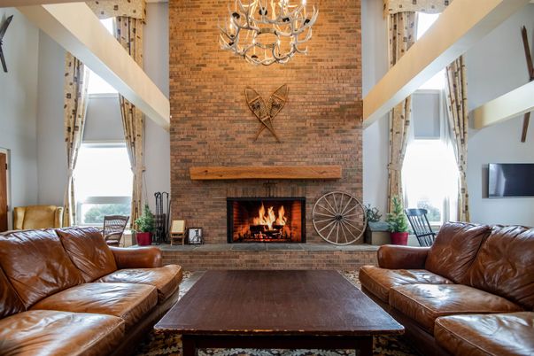 Chandelier, Fireplace, Interior, Living room, Stone Walls