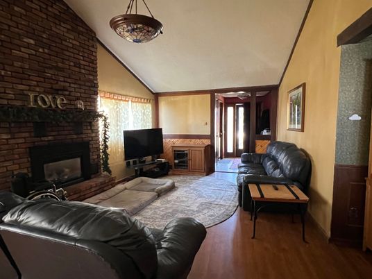 Fireplace, Interior, Living room, Pendant Lights, Stone Walls, Wood Texture Flooring