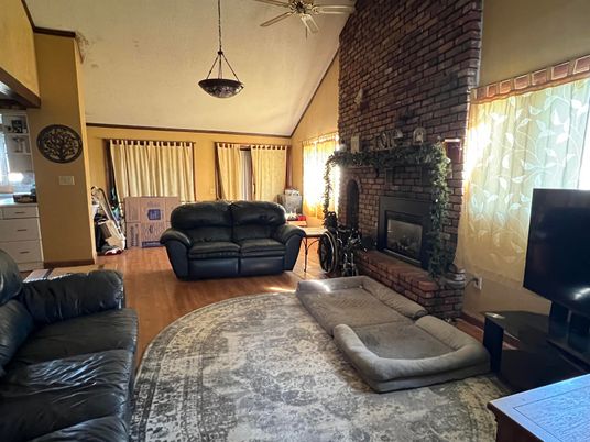 Fireplace, Interior, Living room, Pendant Lights, Stone Walls, Wood Texture Flooring