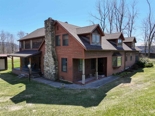 Exterior, Facade, Brick Facade, Log Home