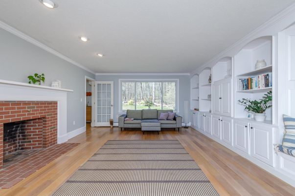 Fireplace, Interior, Living room, Recessed Lighting, Stone Walls, Wood Texture Flooring