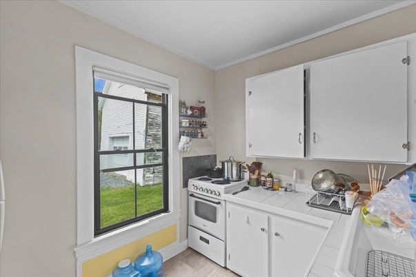Interior, Kitchen, Tile Countertops, Wood Texture Flooring