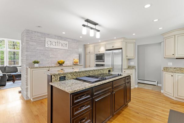 Dining room, Interior, Kitchen, Recessed Lighting, Stainless Steel Appliances, Stone Walls, Wood Texture Flooring