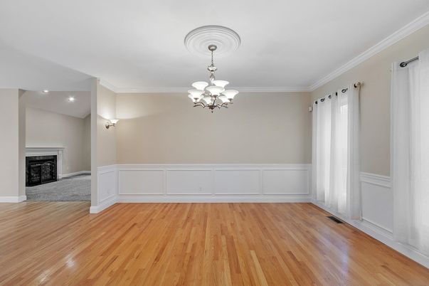 Chandelier, Empty room, Fireplace, Interior, Recessed Lighting, Wood Texture Flooring
