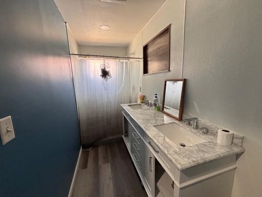 Bathroom, Dual Sink Vanities, Interior, Recessed Lighting, Wood Texture Flooring