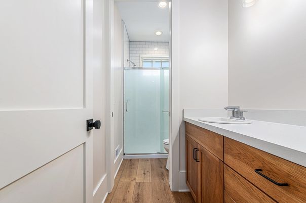 Bathroom, Glass Shower, Interior, Recessed Lighting, Wood Texture Flooring