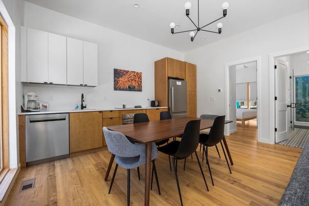 Dining room, Interior, Kitchen, Pendant Lights, Recessed Lighting, Stainless Steel Appliances, Wood Texture Flooring