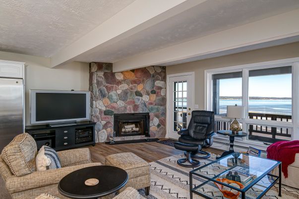 Fireplace, Interior, Living room, Stone Walls, Water, Wood Texture Flooring