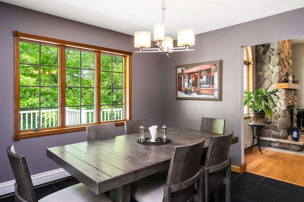Chandelier, Dining room, Fireplace, Interior, Stone Walls, Wood Texture Flooring