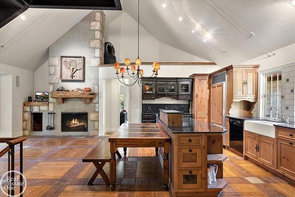 Chandelier, Fireplace, Interior, Kitchen, Recessed Lighting, Wood Texture Flooring