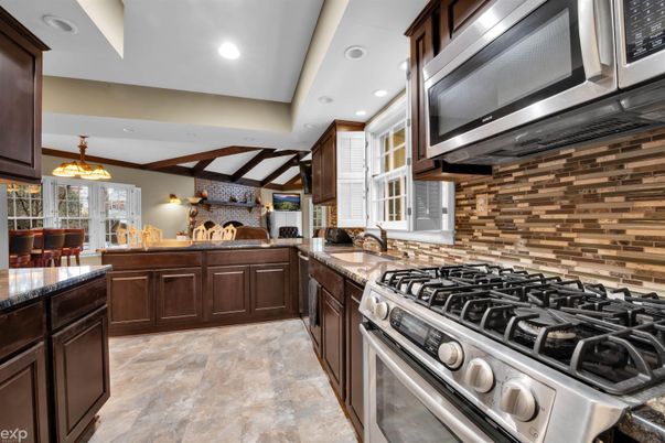 Interior, Kitchen, Pendant Lights, Recessed Lighting, Stainless Steel Appliances, Stone Walls