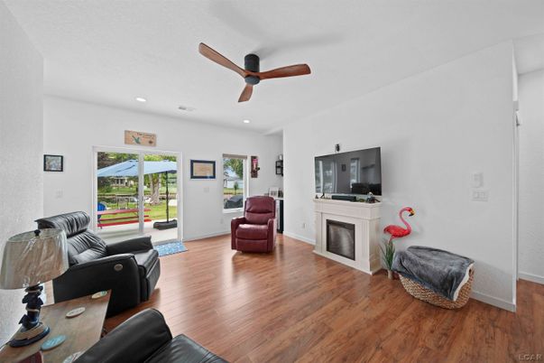 Fireplace, Interior, Living room, Recessed Lighting, Wood Texture Flooring