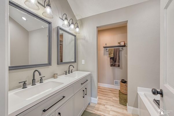 Bathroom, Dual Sink Vanities, Interior, Recessed Lighting, Wood Texture Flooring