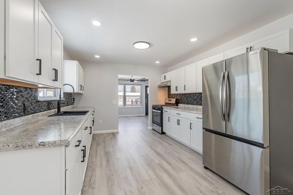 Interior, Kitchen, Recessed Lighting, Stainless Steel Appliances, Wood Texture Flooring