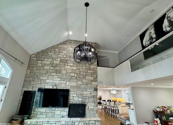 Chandelier, Dining room, Fireplace, Interior, Pendant Lights, Recessed Lighting, Stone Walls