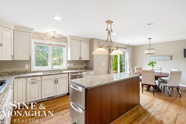 Dining room, Interior, Kitchen, Pendant Lights, Recessed Lighting, Stainless Steel Appliances, Wood Texture Flooring
