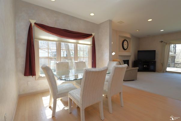 Dining room, Fireplace, Interior, Living room, Recessed Lighting, Wood Texture Flooring