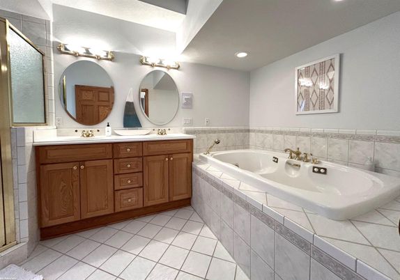 Bathroom, Dual Sink Vanities, Interior, Recessed Lighting, Tile Countertops