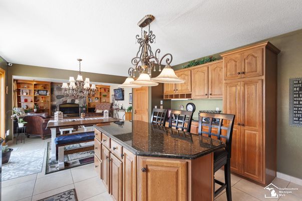 Chandelier, Dining room, Fireplace, Interior, Kitchen
