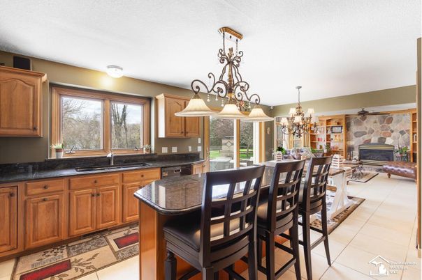 Chandelier, Dining room, Fireplace, Interior, Kitchen, Stone Walls