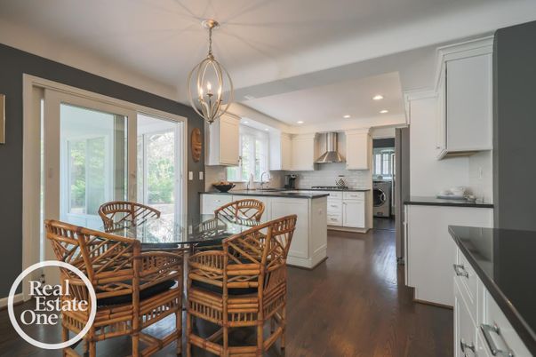 Chandelier, Dining room, Interior, Kitchen, Pendant Lights, Recessed Lighting, Stainless Steel Appliances, Wood Texture Flooring