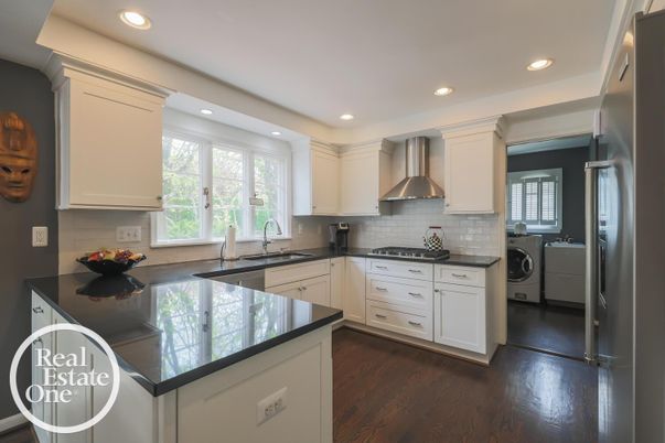 Interior, Kitchen, Recessed Lighting, Washer, Wood Texture Flooring