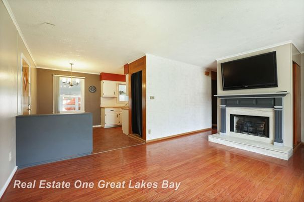 Chandelier, Empty room, Fireplace, Interior, Kitchen, Pendant Lights, Wood Texture Flooring