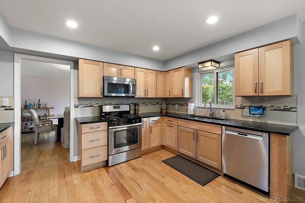 Dining room, Interior, Kitchen, Recessed Lighting, Stainless Steel Appliances, Wood Texture Flooring